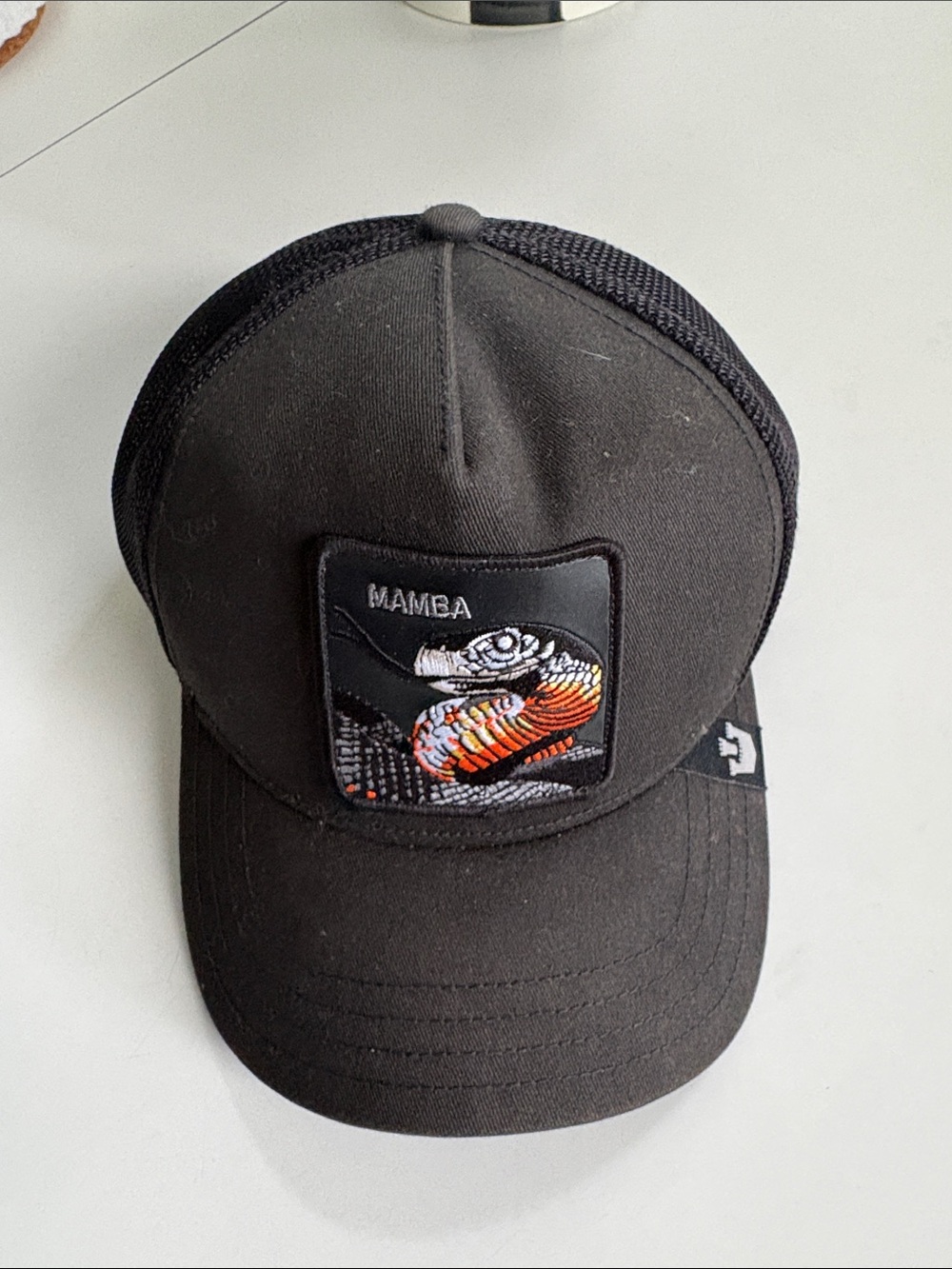 Mamba Embroidered Snake Patch Black Trucker Hat
